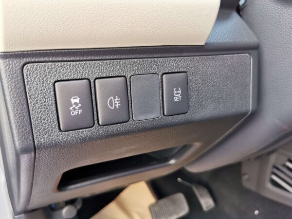Toyota Rush G 2022 1.5P Brown Traction Contol & Tyre Pressure Buttons